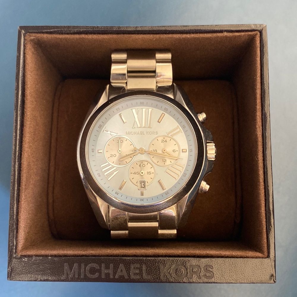 Like new Michael Kors silver watch.  Needs new battery.